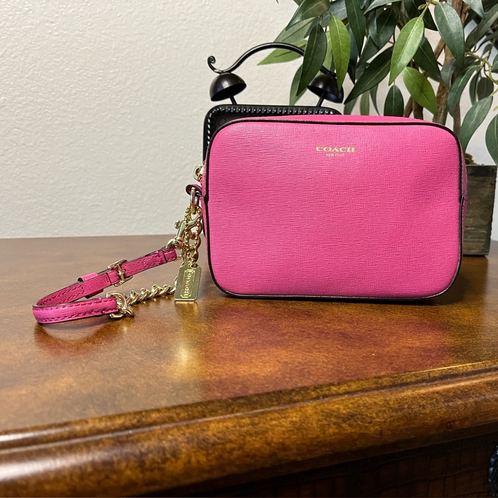 NWOT COACH Saffiano Leather Flight
Wristlet, Pink/Brass No. F49790